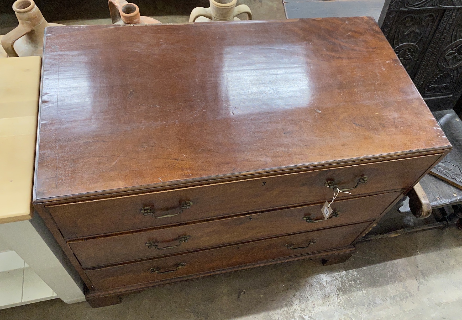 A George III mahogany three drawer chest, width 105cm, depth 55cm, height 92cm